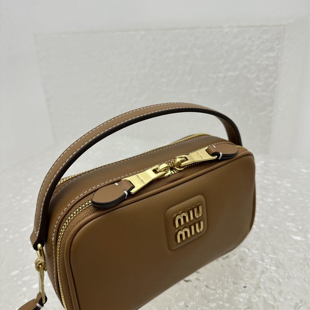 I love the versatility of the Miu Miu bag Its timeless appeal makes it easy to dress up o