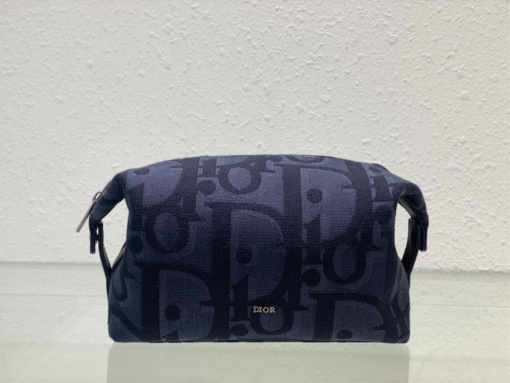 Dior toiletriesThis toiletry bag is a new addition to the 2024 Spring Mens Wear collection practical and elegant Crafted with black oversized Obliq