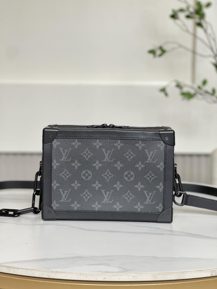 M44730 SOFT TRUNK Chain PackChoose Monogram Eclipse canvas and misty black metal pieces paired with adjustable black leather shoulder straps to achi