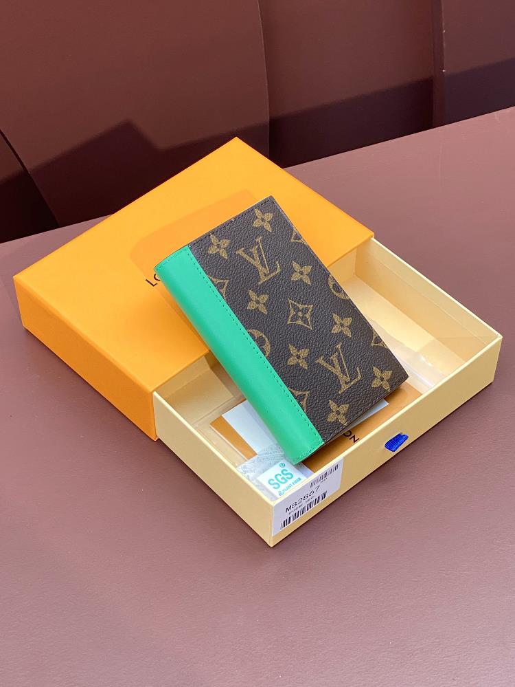 M82867 green passport case this passport case is made of Monogram Macassar canvas with bright leather trim and the fabric lining continues the same
