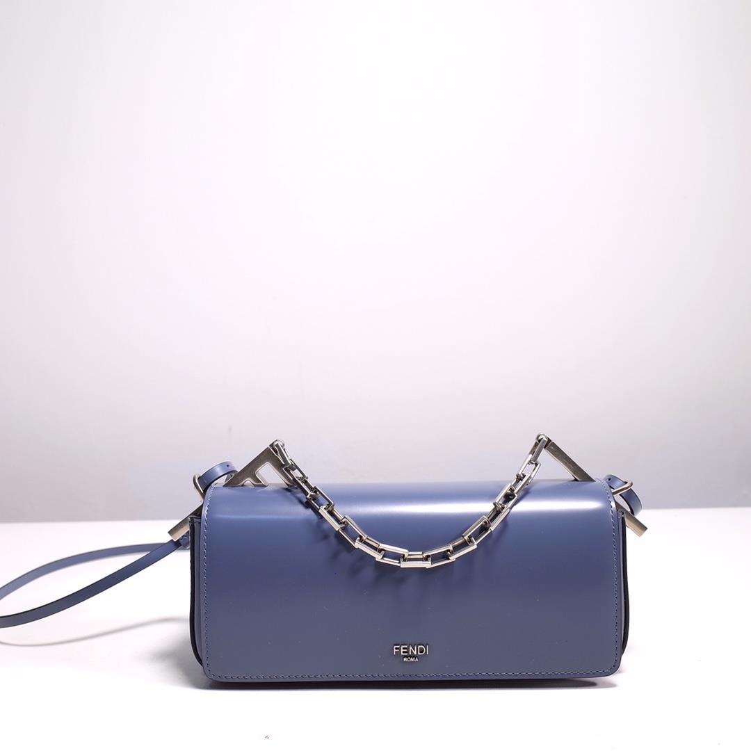 The FENDI handheld bag is made of blue brushed leather material decorated with large F metal accesso