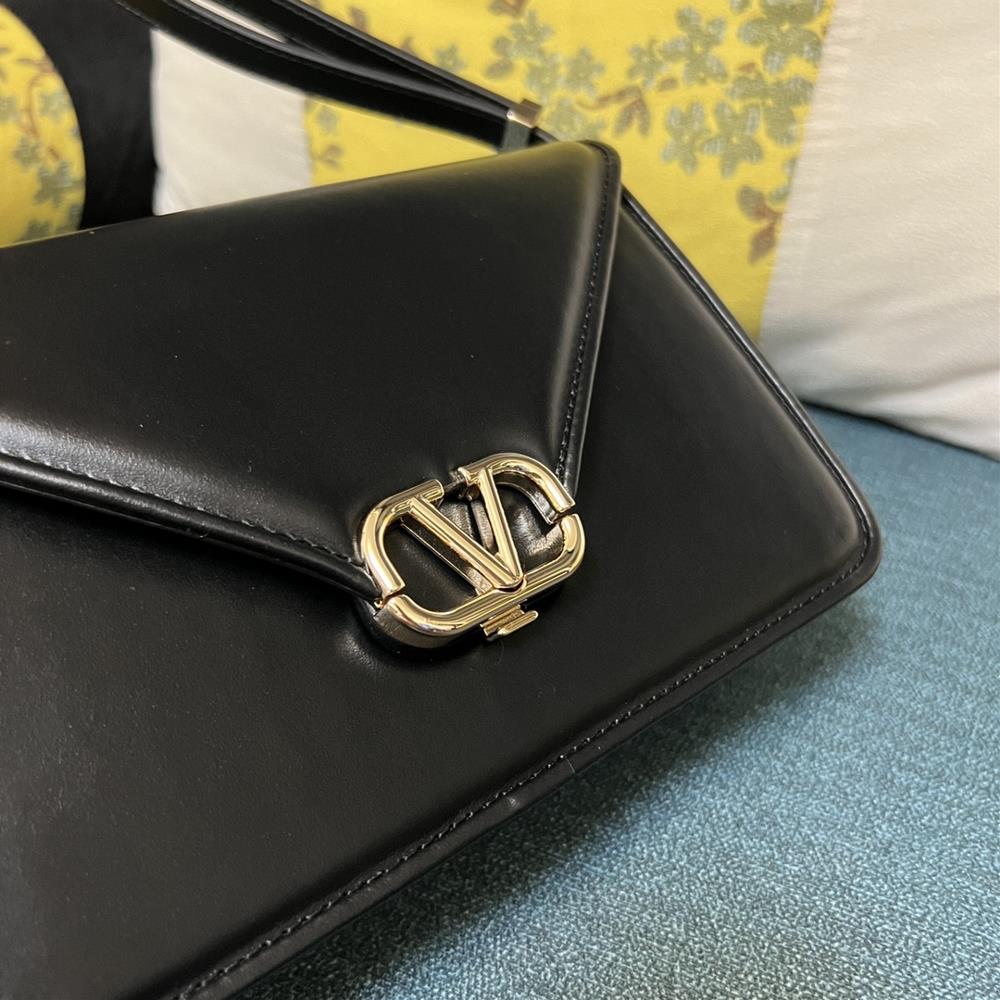 Another hallmark of the Valentino bag is the VLogo signature a sleek and modern emblem th