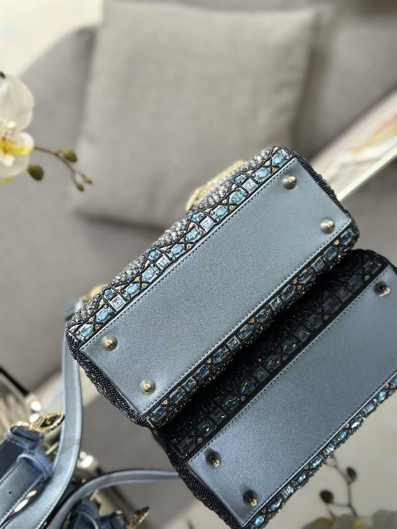 The limited edition of Lady Dior features four embroidered rhinestone blue accents and importe