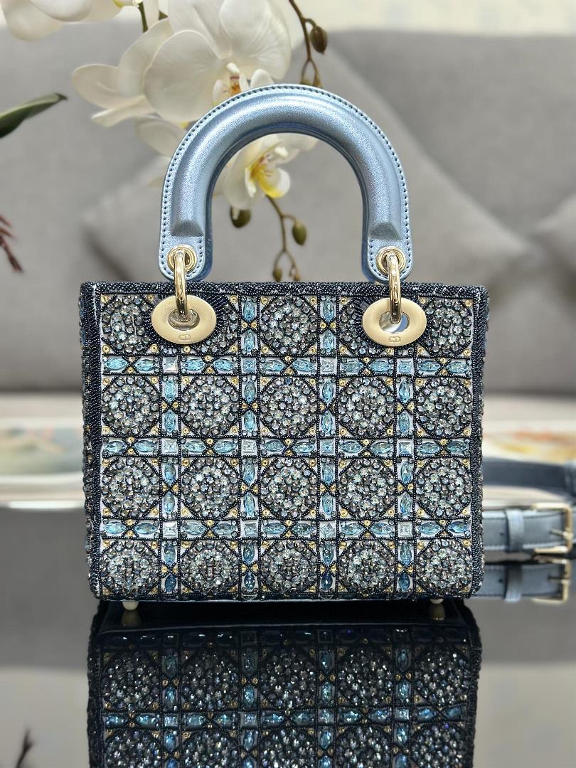 The limited edition of Lady Dior features four embroidered rhinestone blue accents and importe