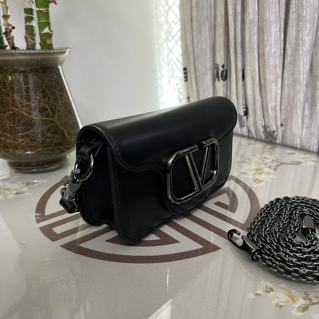 Small Garavani MINI LOC calfskin handbag with metal VLogo Signature detailsEquipped with detac