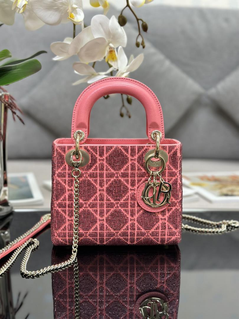 Lady Diors three grid embroidered pearl tube with a pink lining and lamb tendons the handbag embod