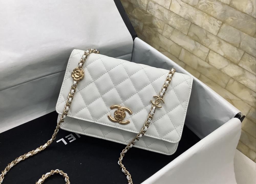 chanel 23K Limited Edition Camellia Woc features various classic elements black and white cowhide rotating buckle Camellia design retro metal color