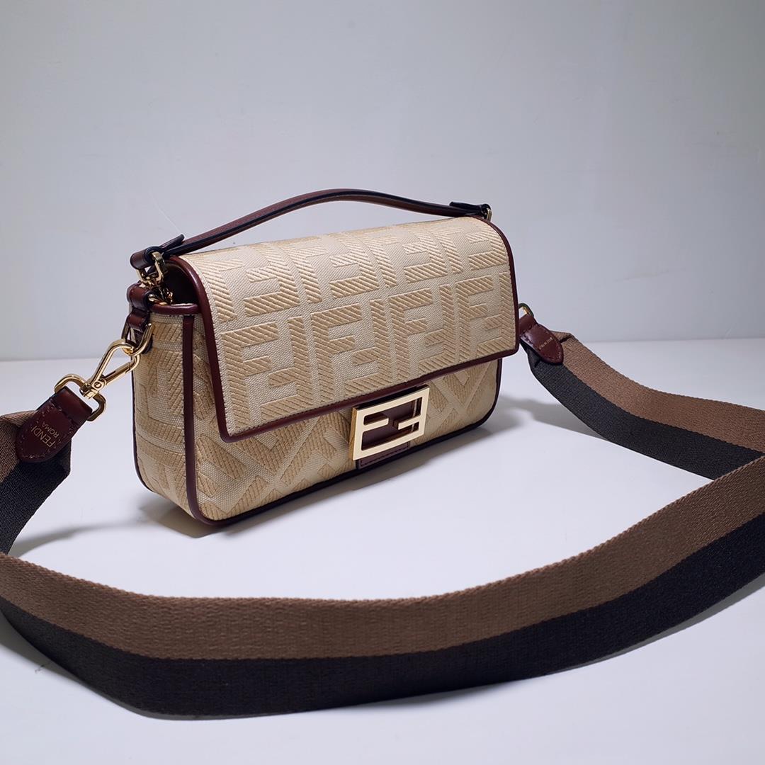 The FEND1 iconic Baguette handbag is made of beige canvas material adorned with FF pattern emb