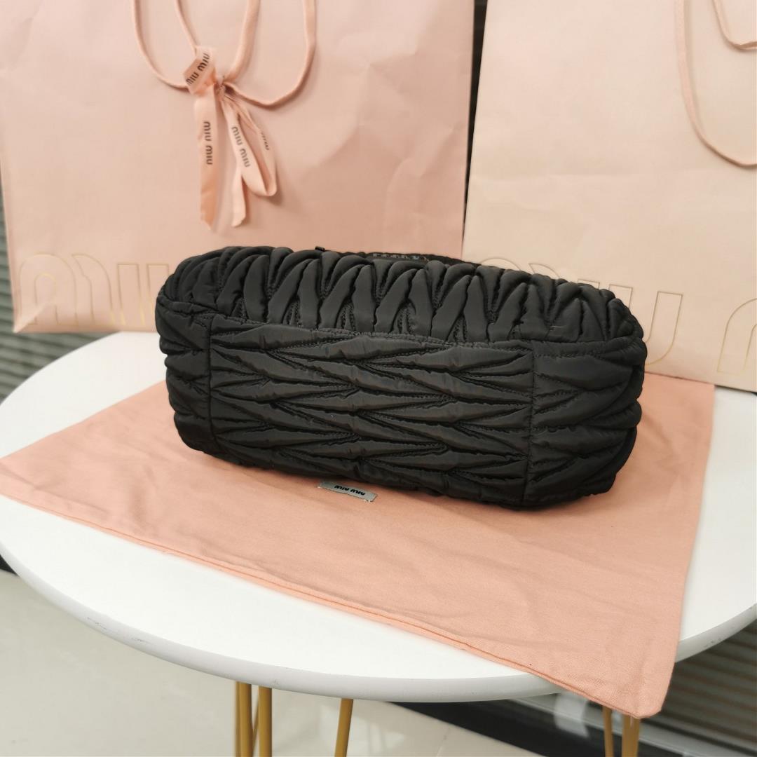 MiuWander handbag a new product of M family is made of environmentfriendly nylon The yarn is m