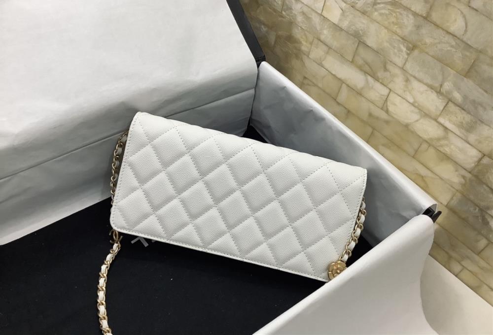 Owning a Chanel Bag Camellia Underarm Bag is not just about owning a fashionable accesso