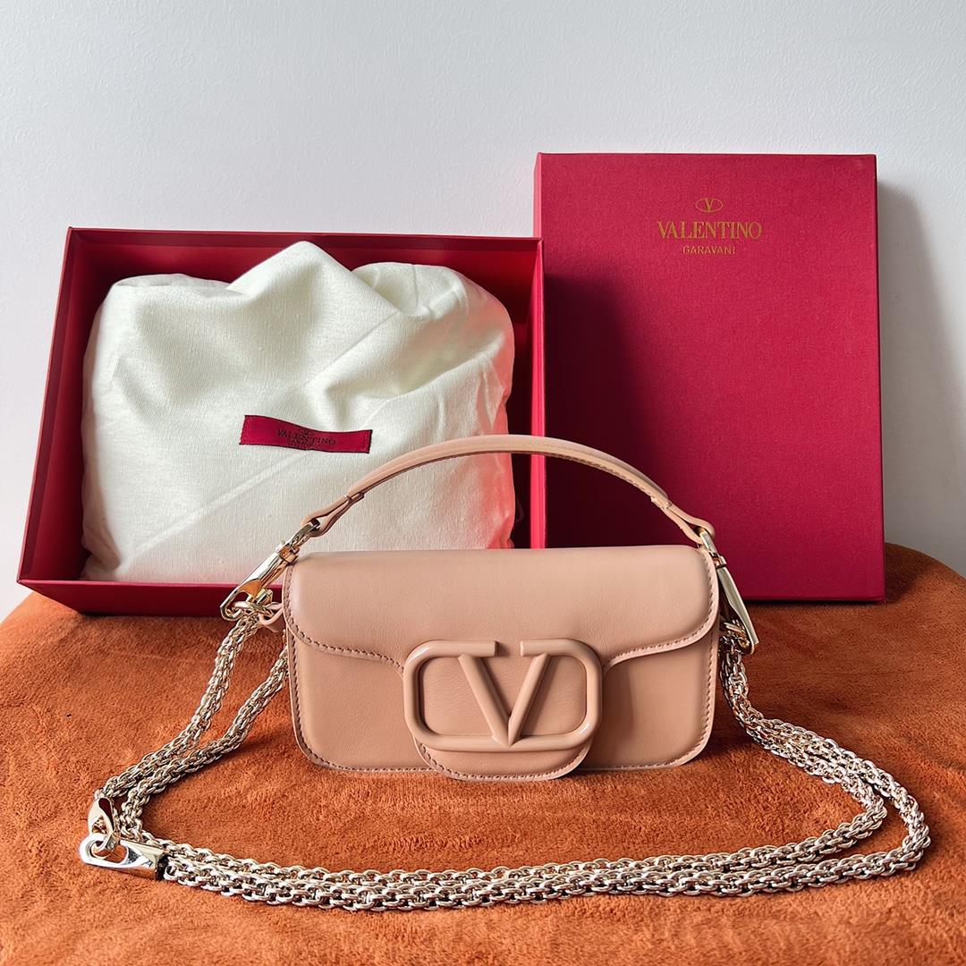 Valentino Garavani Mini Loc calfskin handbag with matching enamel VLogo Signature details Equipped w