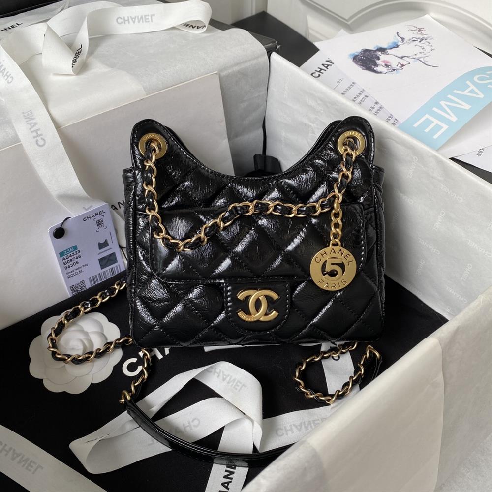 The small Chanel 23B model AS4323 oil wax leather hobo seat stable shoulder bag has the highest atte