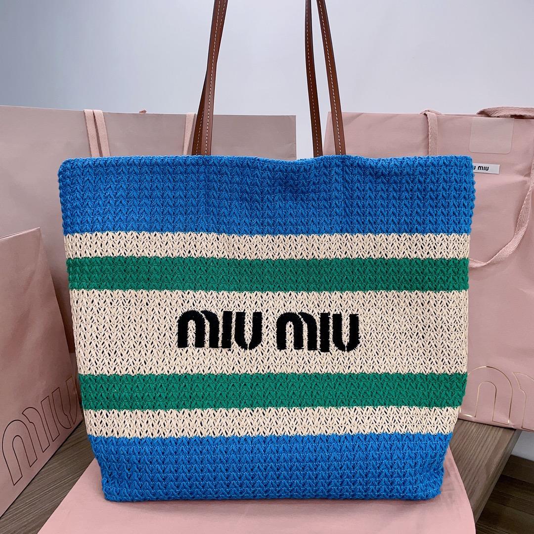 The M familys new imported Lafite grass woven cotton thread woven tote bag has the only matching qua