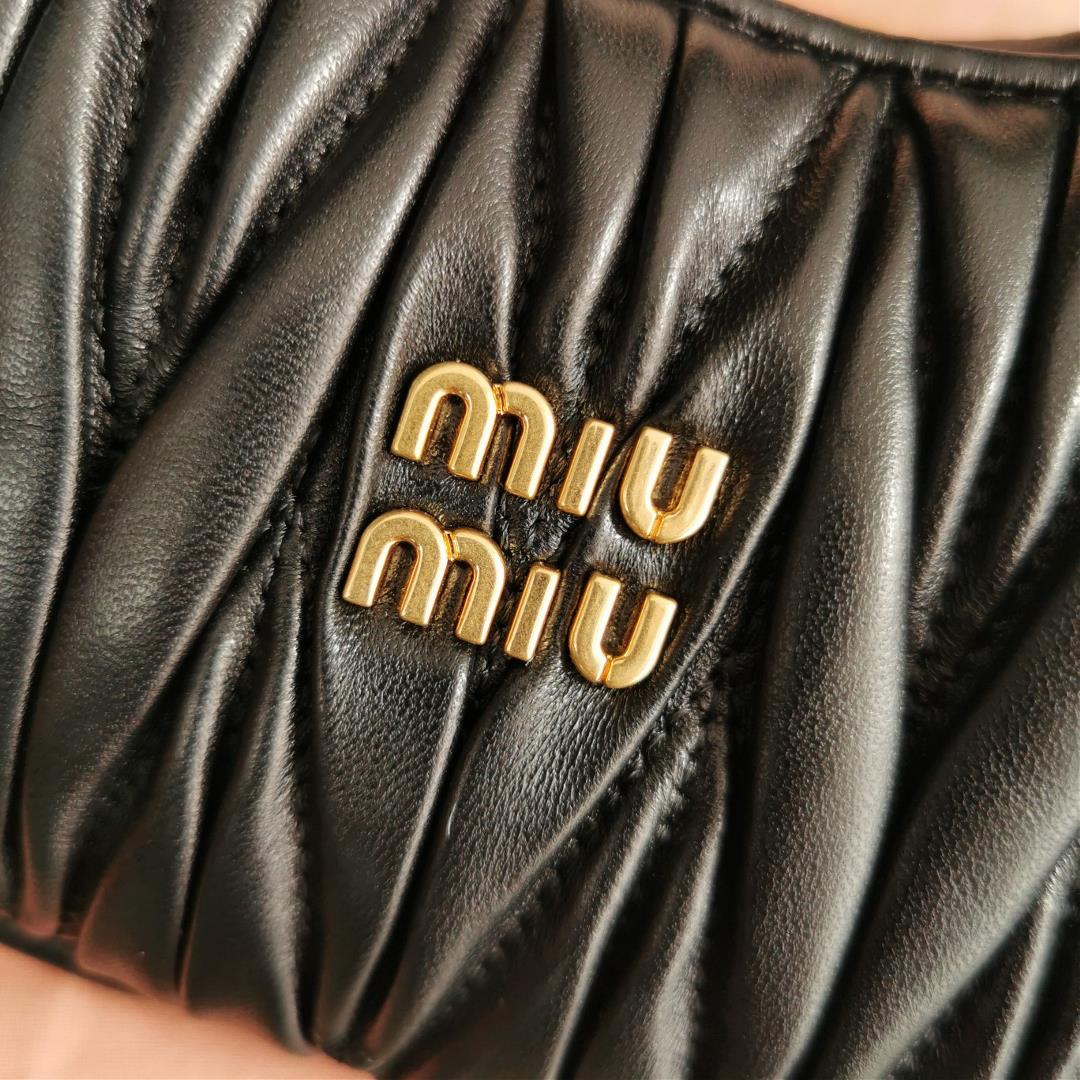 Small size The M familys new mini MiuWander handbag features imported lamb skin classic brand 