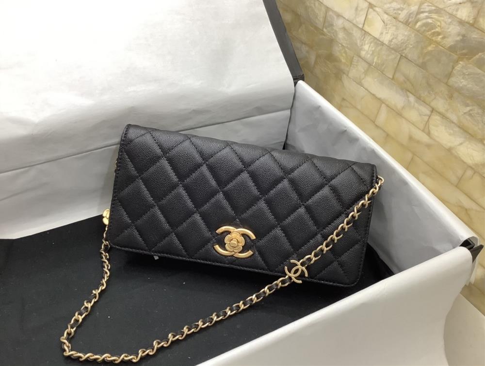 chanel 23K Limited Edition Camellia Underarm Bag features various classic elements black and white cowhide rotating buckle Camellia design retro met