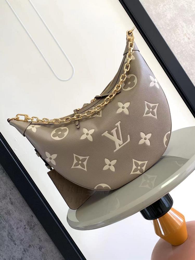 M46725 M46738 gray screen printingFeaturing soft Monogram Imprente cowhide leather to create a trendy half month silhouette that conforms to your body