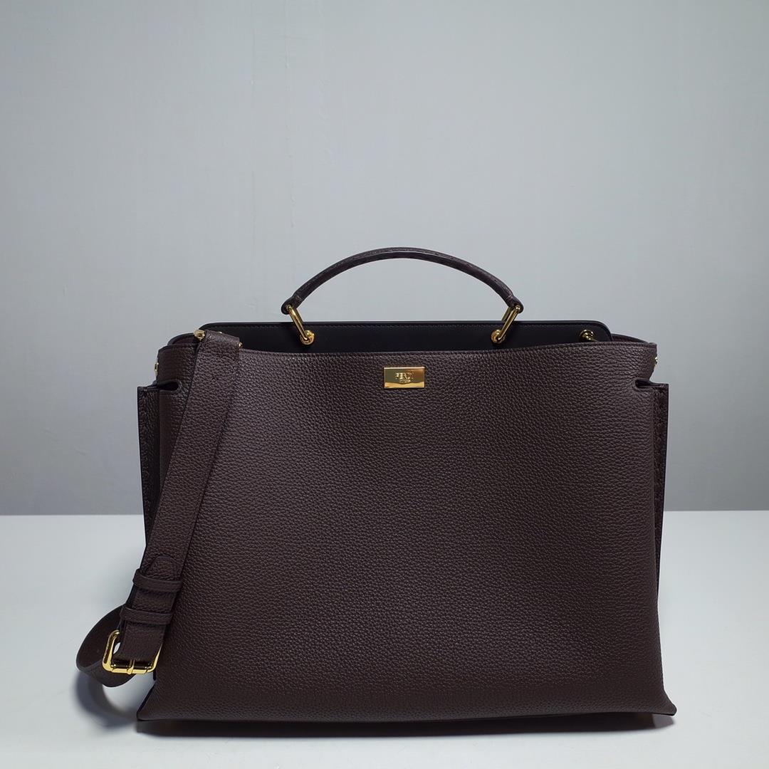 fendi minimalist design lightweight handbag with two compartments separated by a hard board in the