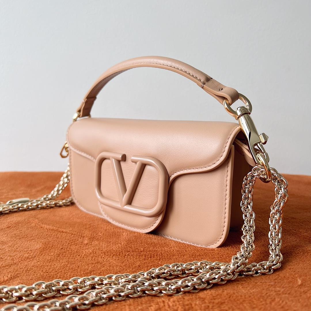 Valentino Garavani Mini Loc calfskin handbag with matching enamel VLogo Signature details