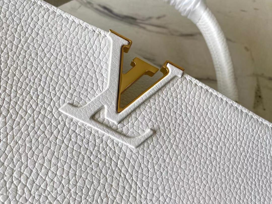 The top quality original M22512 white Capuchines medium size handbag showcases the new seasons