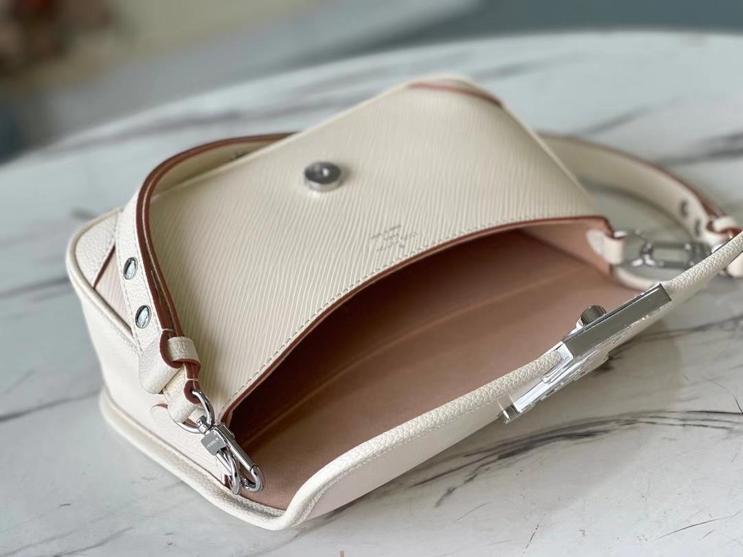 The toplevel original M59457 beige Buci handbag is made of iconic Epi leather with smooth leat