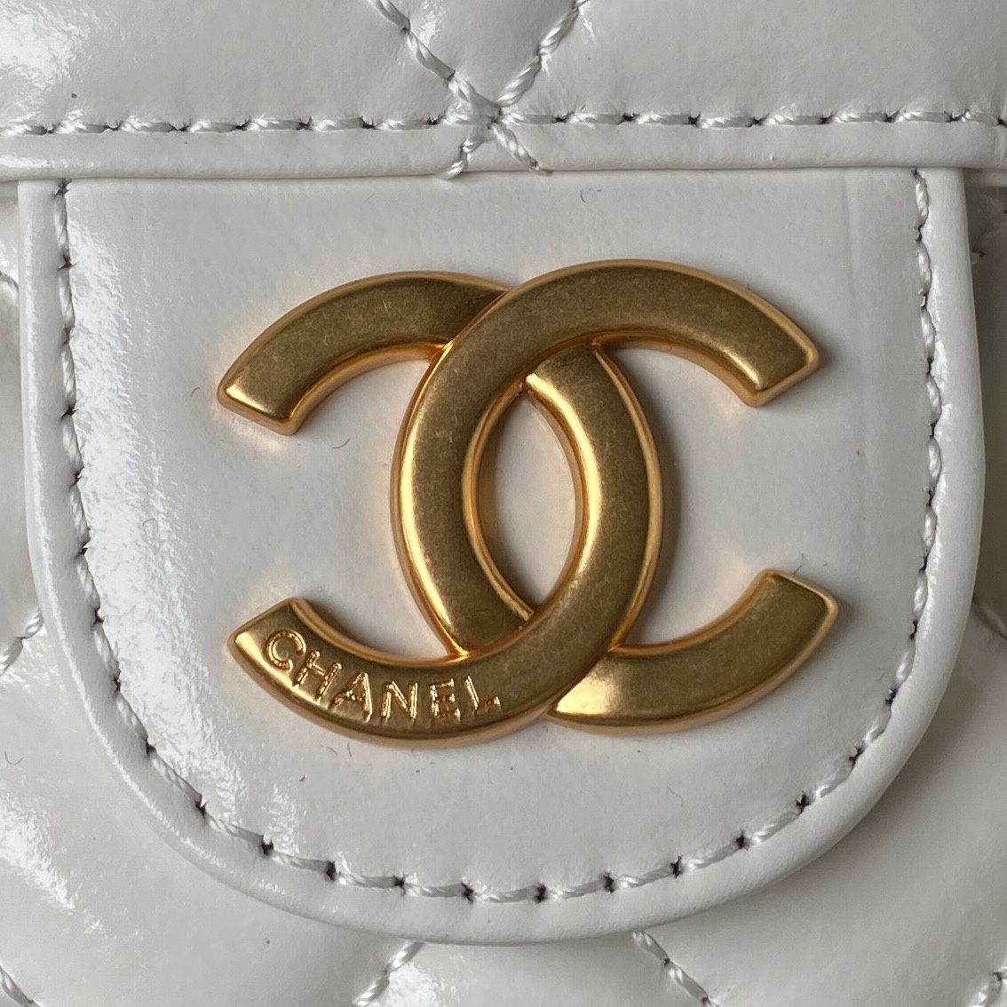 The small Chanel23C model AS3710 oil wax leather hobo stable shoulder bag has the highest atte