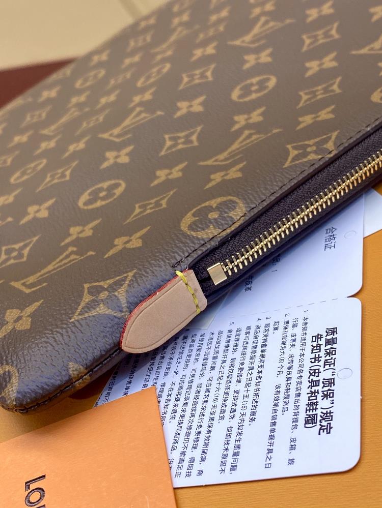 Owning an LV Bag Large ETUI VOYAGE Medium Handbag is more than just a material possession