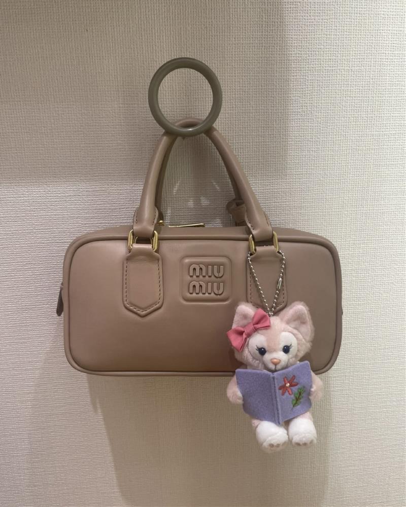 In conclusion the Miumiu Bowling bag in milk tea color has captured the hearts of fashion