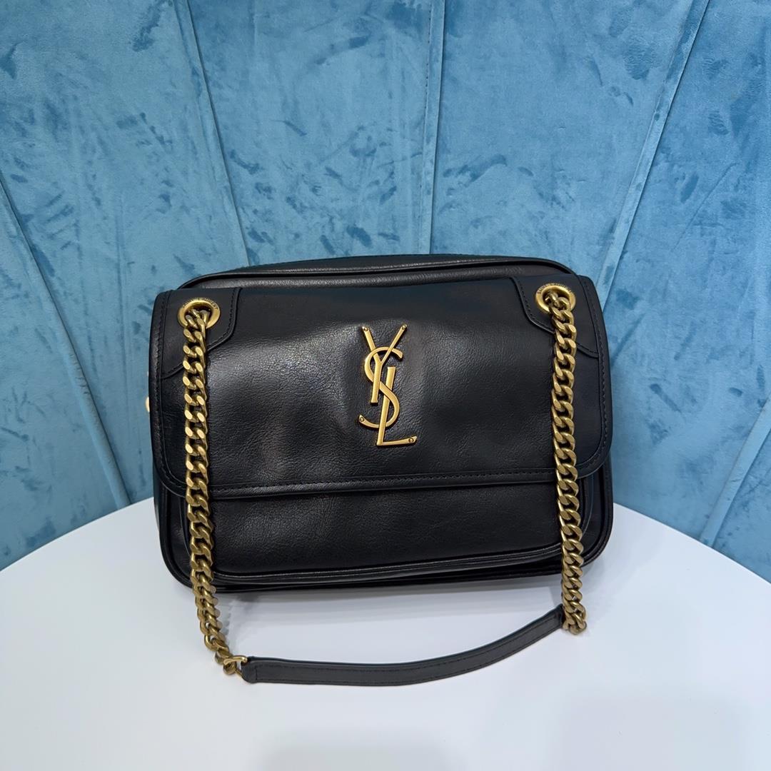 CASSANDRE handbag features a front flip and zipper closure design adorned with the classic YSL log