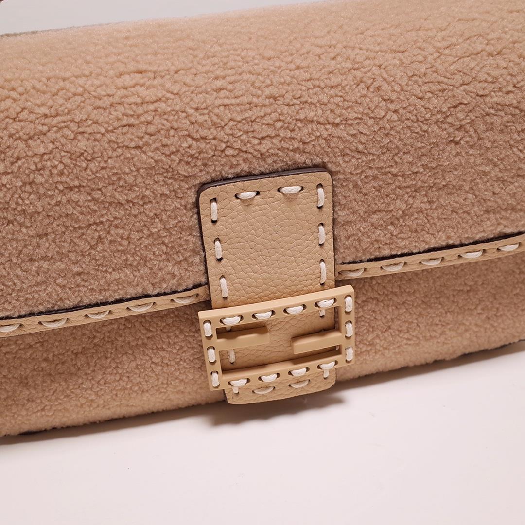 1080 FEND1 signature medium Baguette handbag made of soft pink merino sheepskin with oversized