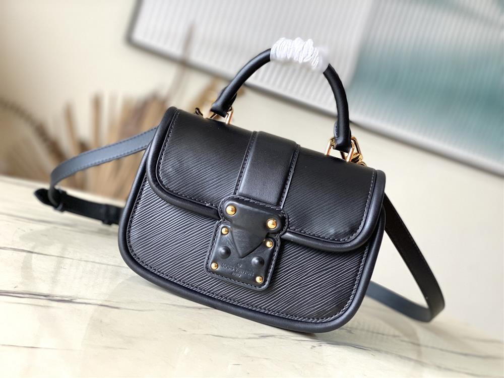 M22724 blackThis Hide Seek handbag features Epi leather accents in bright tones featuring a Toron roller handle and leather wrapped lock buckle trac
