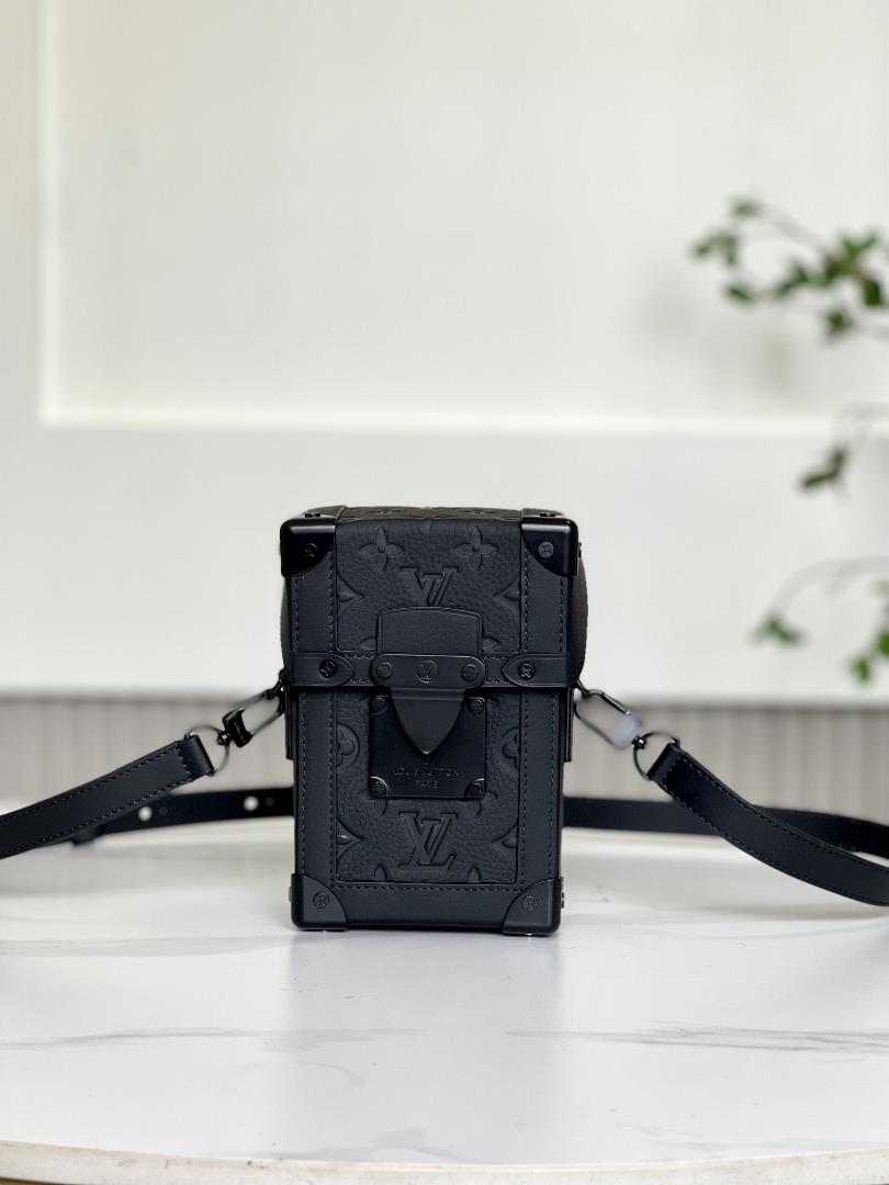 M82070 full leatherThe Vertical Trunk mini handbag showcases the box making heritage and modern conc