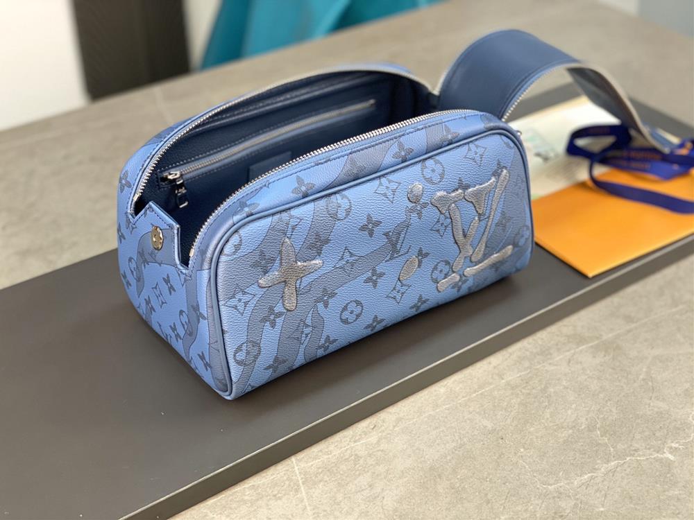 M82337 Drip Glue Blue This Dopp Kit toilet bag is made of Monogram Aquagarden canvas with