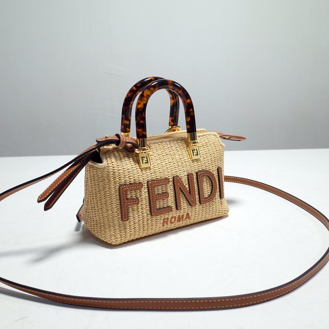 FENDI iconic By The Way Mini Boston handbag made of natural grass woven material showcasing mo