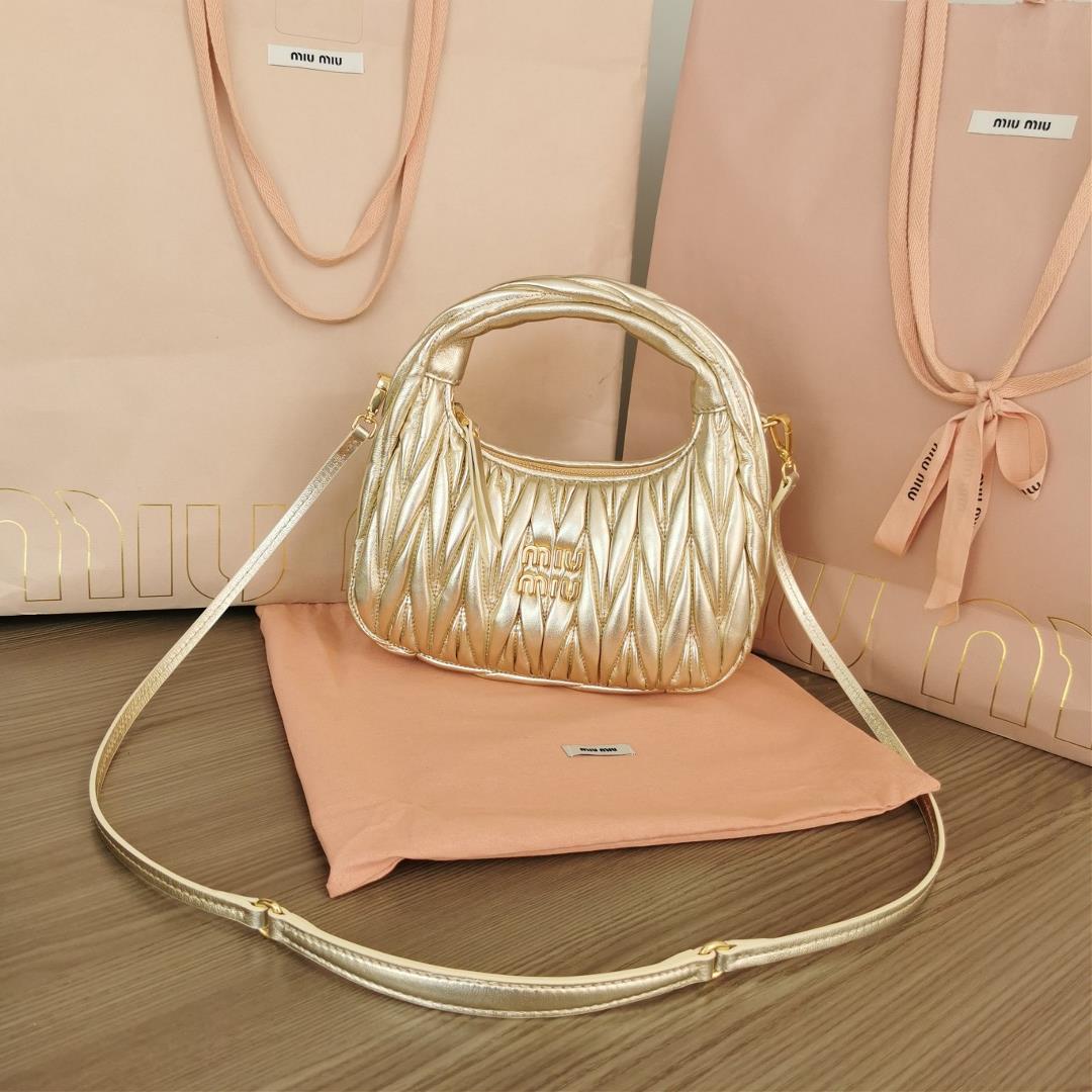 Medium The MiuWander handbag a new product from M family features the iconic Matelasse texture embro