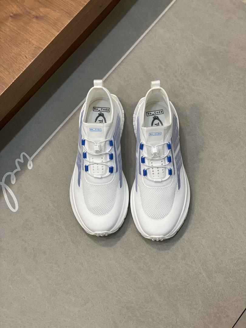 Tods leather sports fabric fabric sneakersThis sneaker blends sportsmanship with classic Tods eleme