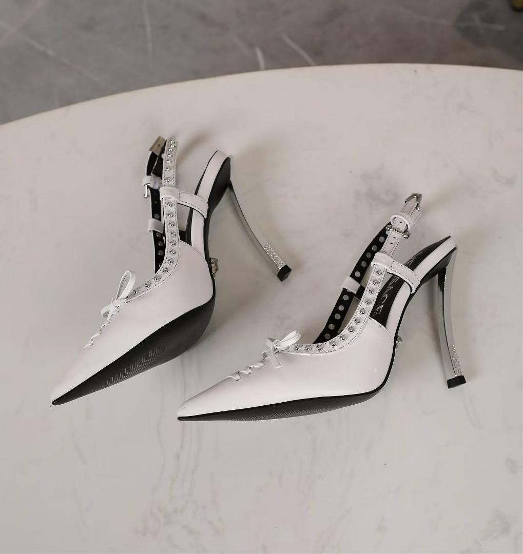 Versaces new pointy leather sandals are designed with curved metal stiletto heels with logo Th