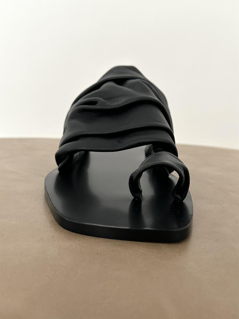 Black THE ROW Wrap Leather Sandals Size 3540 This Drape sandal is carefully crafted from sheep