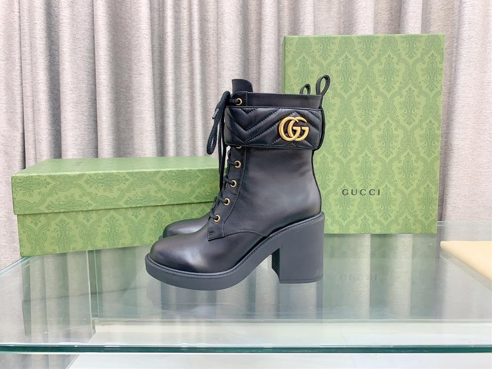 This womens high heel ankle boot is meticulously decorated with classic double G shaped