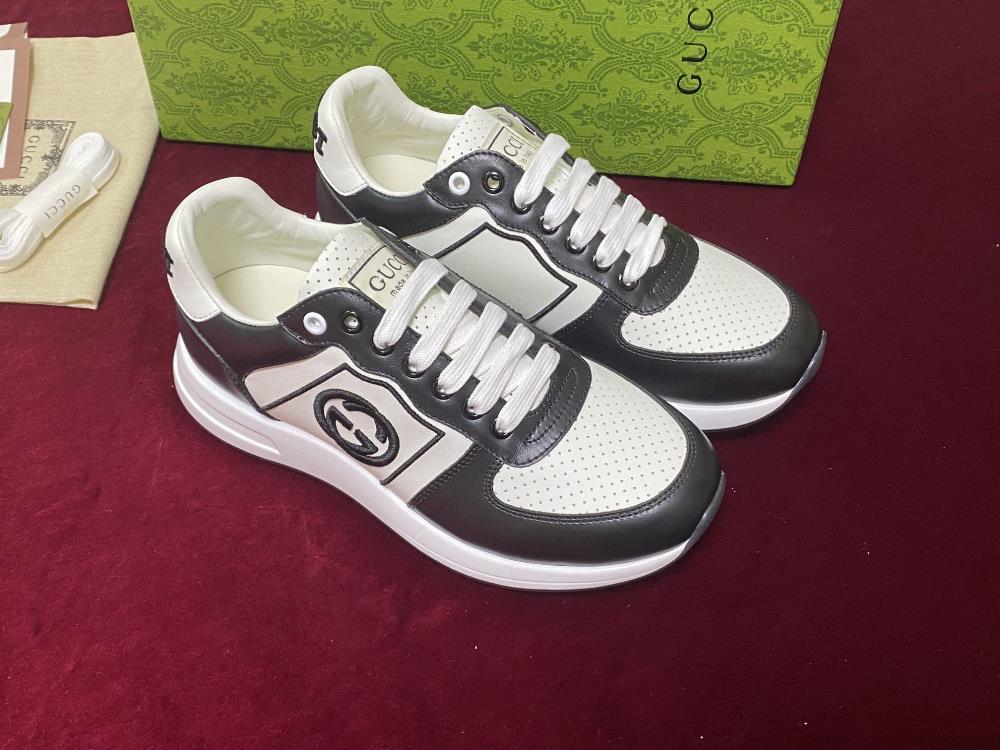 Gui Low Top Sneaker CollectionThis sneaker features a top layer of leather and classic perforated design with an embroidered brand logo on the tail a