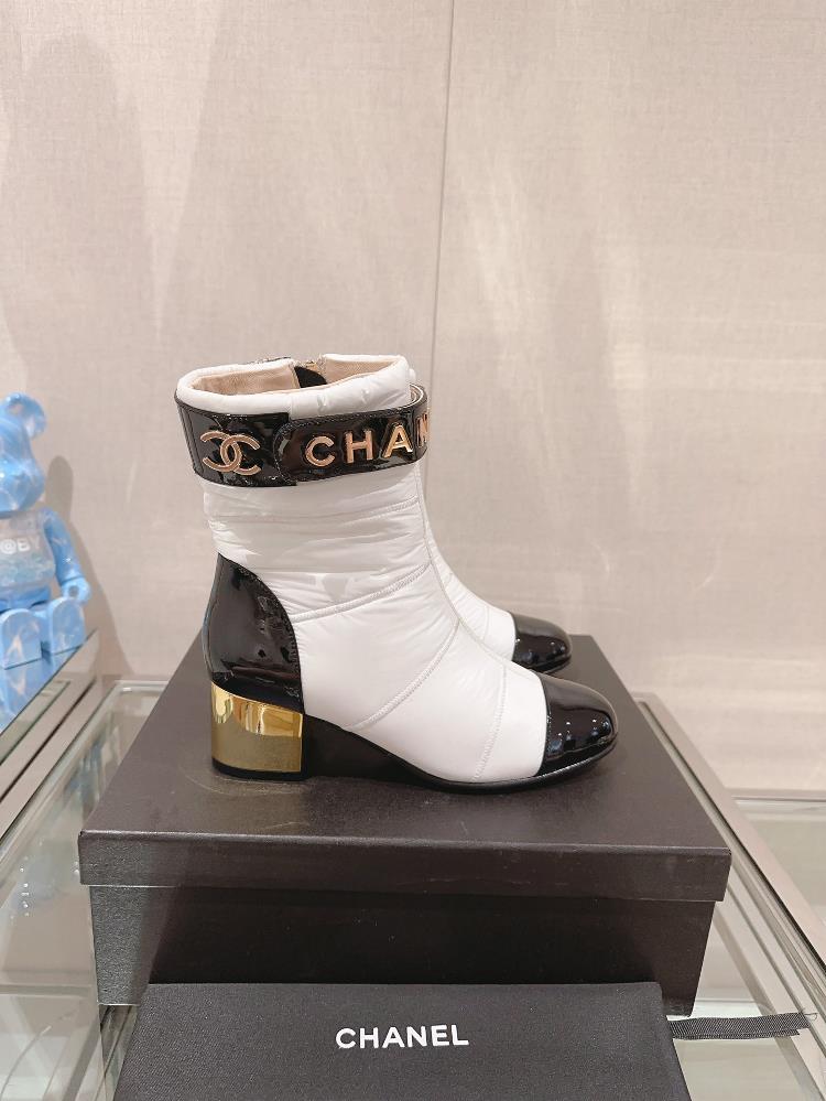 Chanel Autumn and Winter Down Thick Heel Short Boots The down bun feels warm and light on the feet and I really love the overall design Its trendy