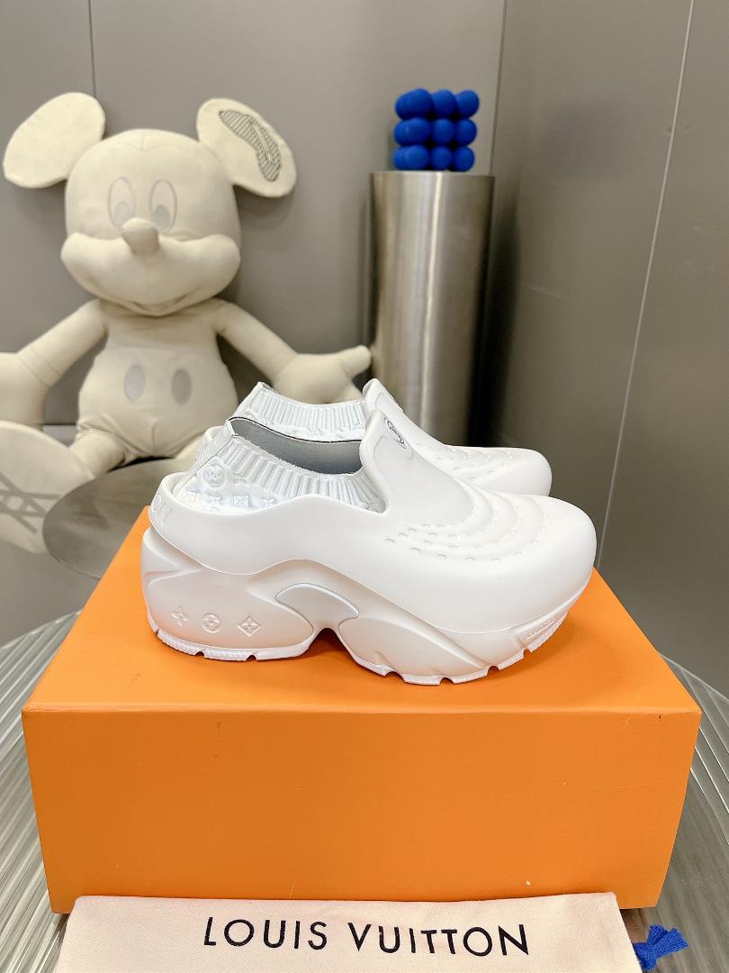 The shoe that debuted in the 2023 fashion show is named Louis Vuitton Shark Clog The shell mat